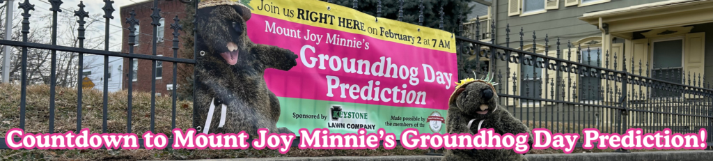 Mount Joy Minnie with her Groundhog Day banner