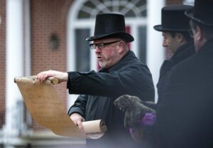 Greg Sallade reads Mount Joy Minnie's proclamation in 2022.