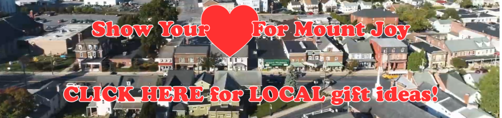 CLICK HERE for Valentine's Day local gift ideas showing background of Main Street Mount Joy